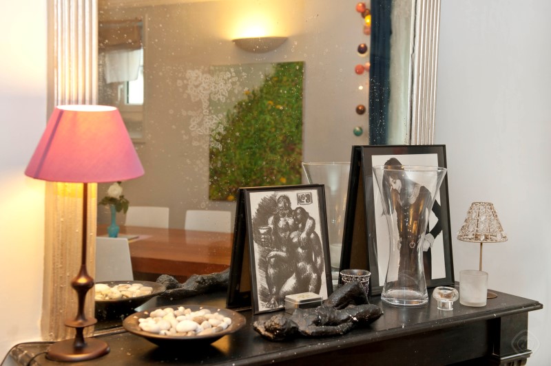 Living Room with Table Displays Chic Saint Germain apartment Paris