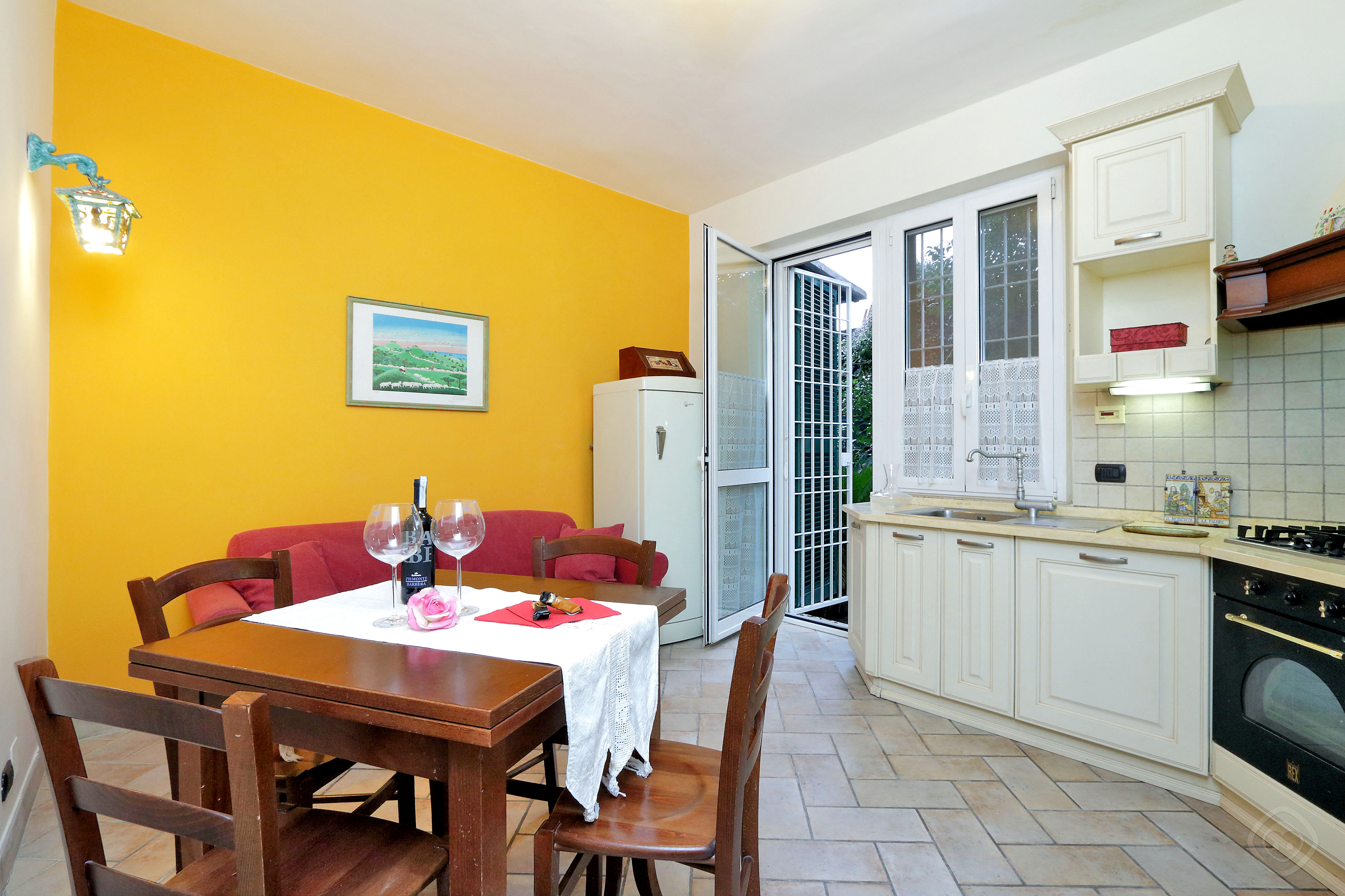 Dining Area and Kitchen Appia Park apartment Rome