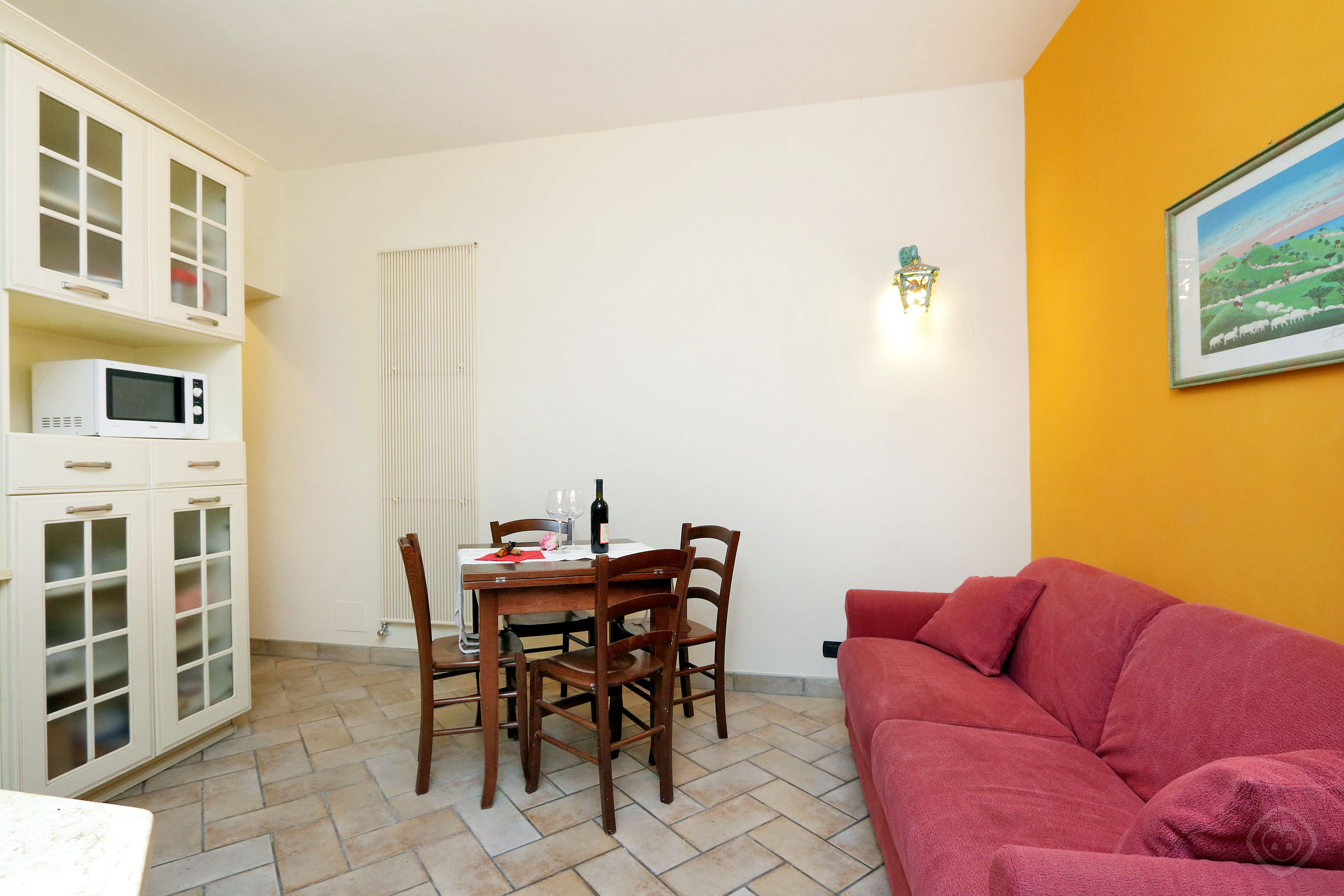 Sofa and Dining Area Appia Park apartment Rome