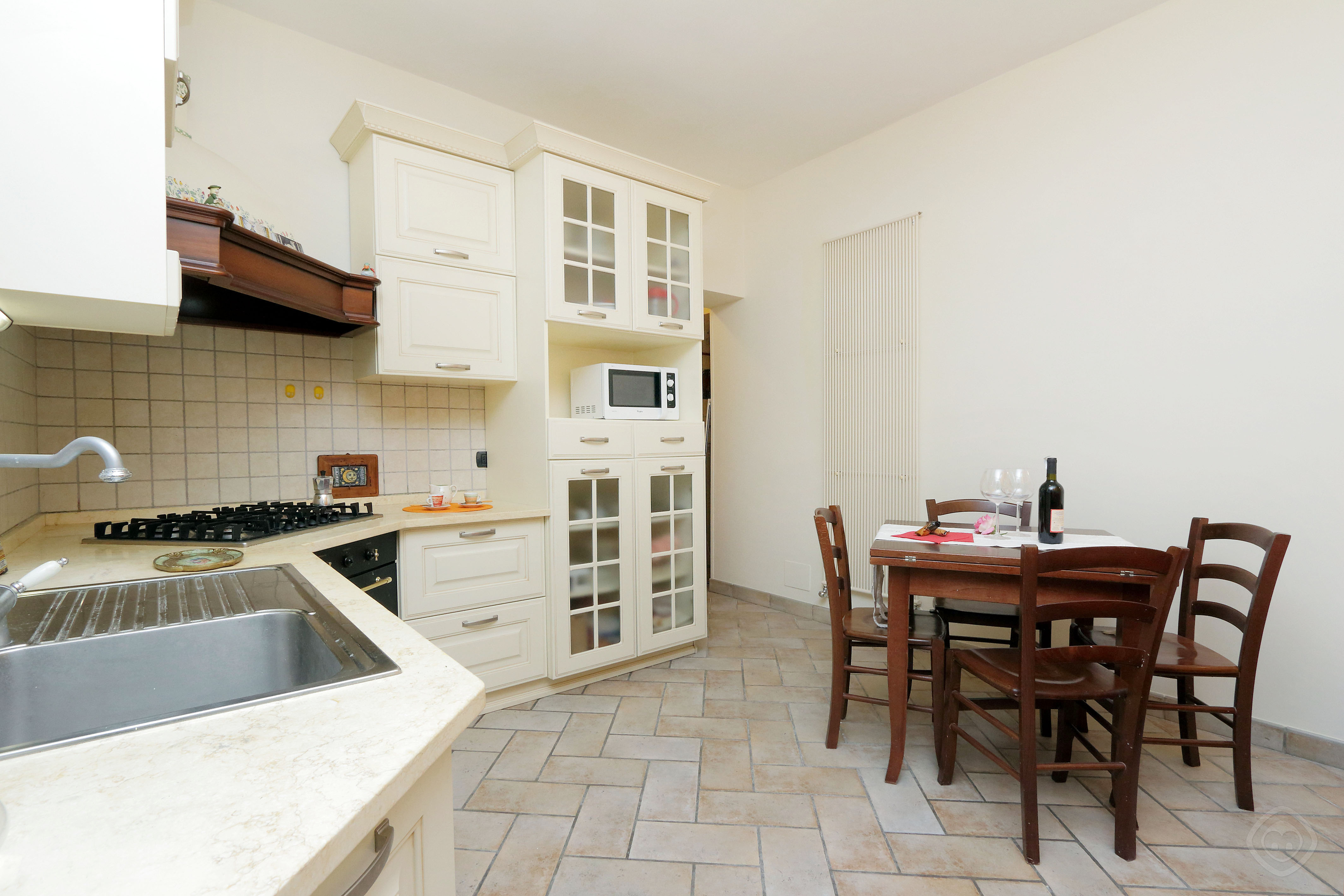 Dining Area and Kitchen other angle Appia Park apartment Rome